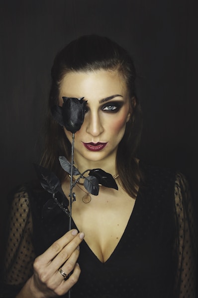 woman in black and white polka dot shirt