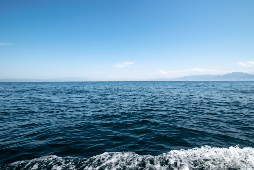 blue sea under blue sky during daytime