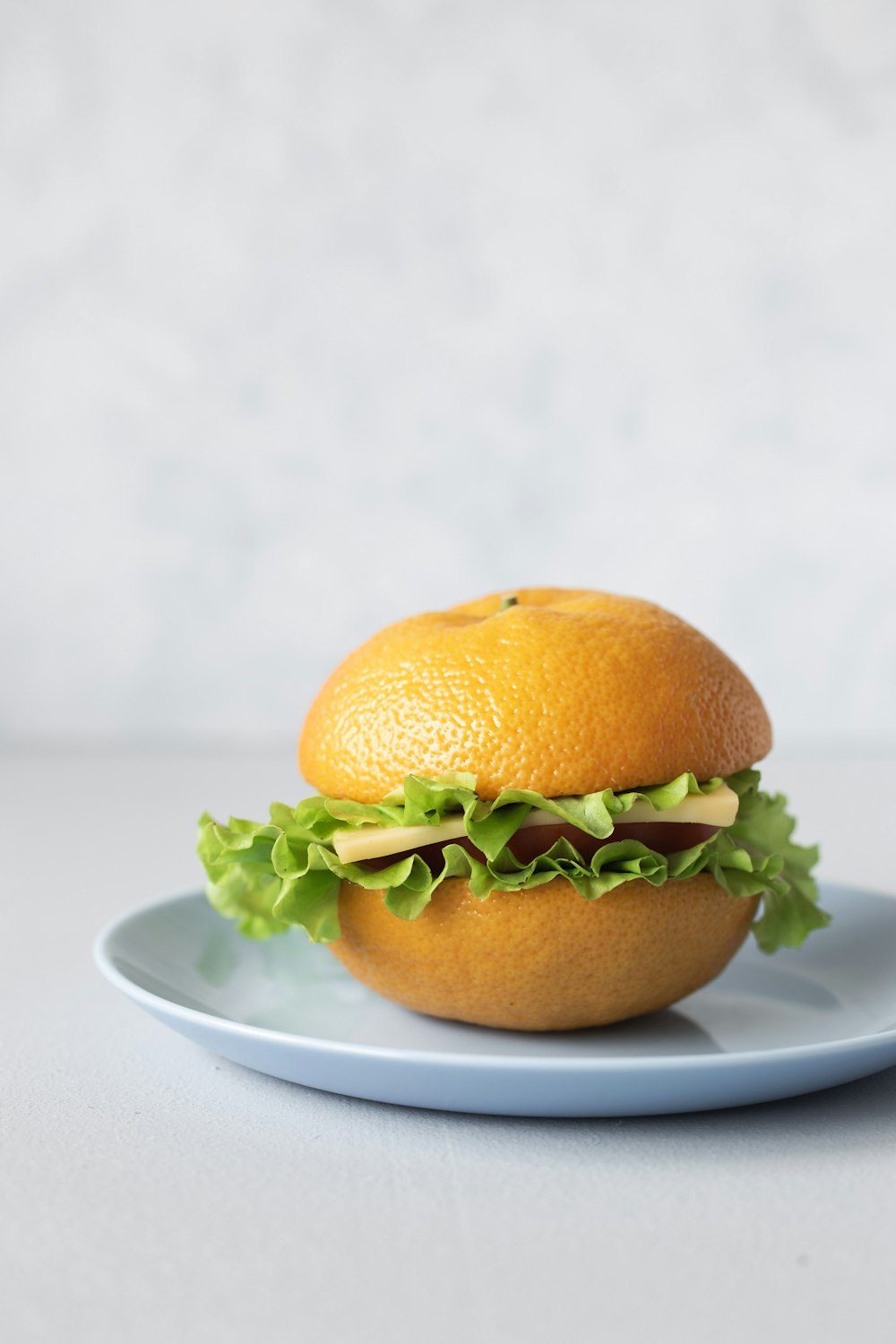 burger on white ceramic plate