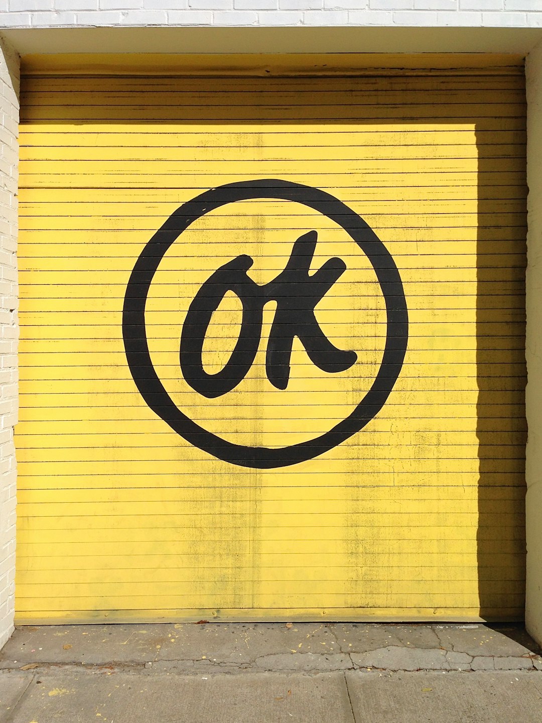 yellow pull-down door with ok on it