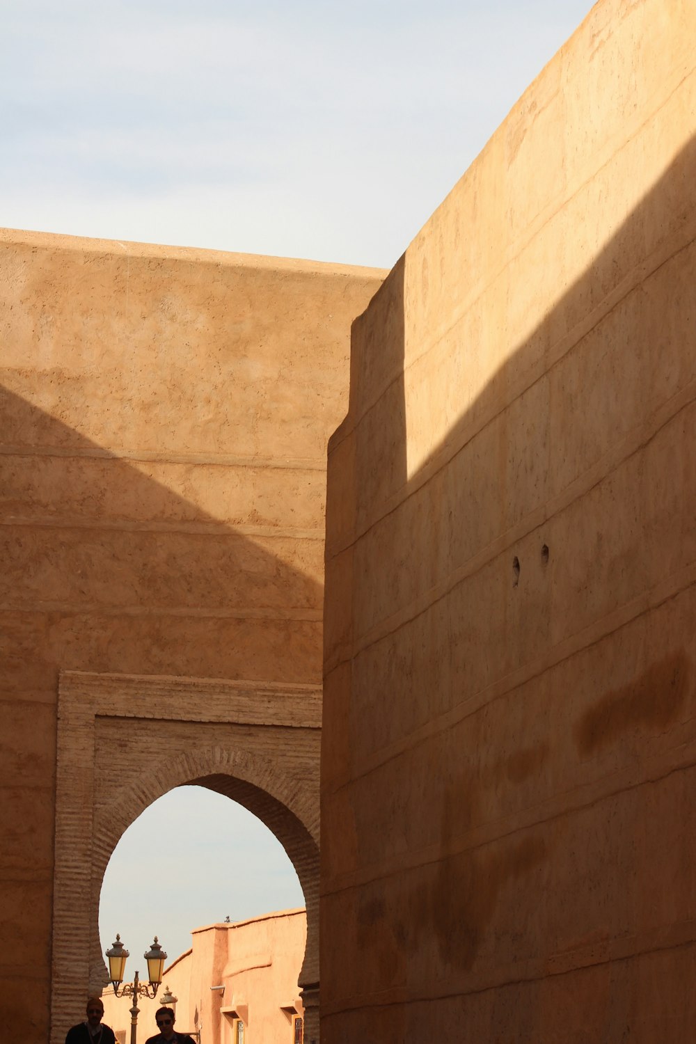 brown concrete building under blue sky during daytime