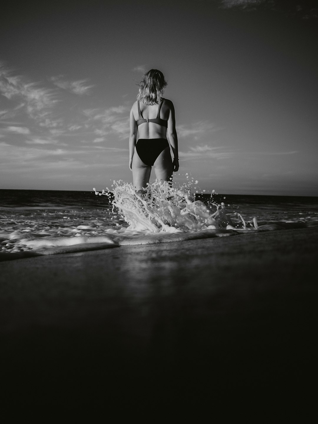 woman in black bikini on beach