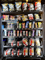 assorted food packs on shelf
