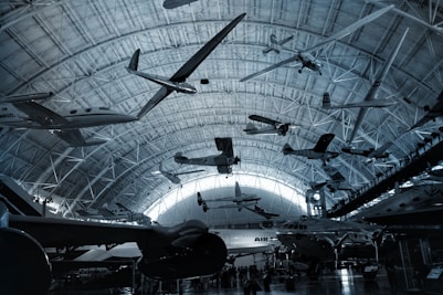 black and white airplane in a building