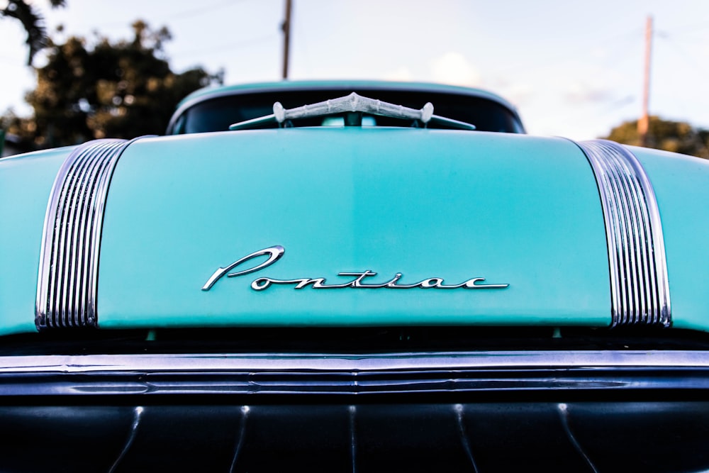 blue chevrolet camaro in close up photography