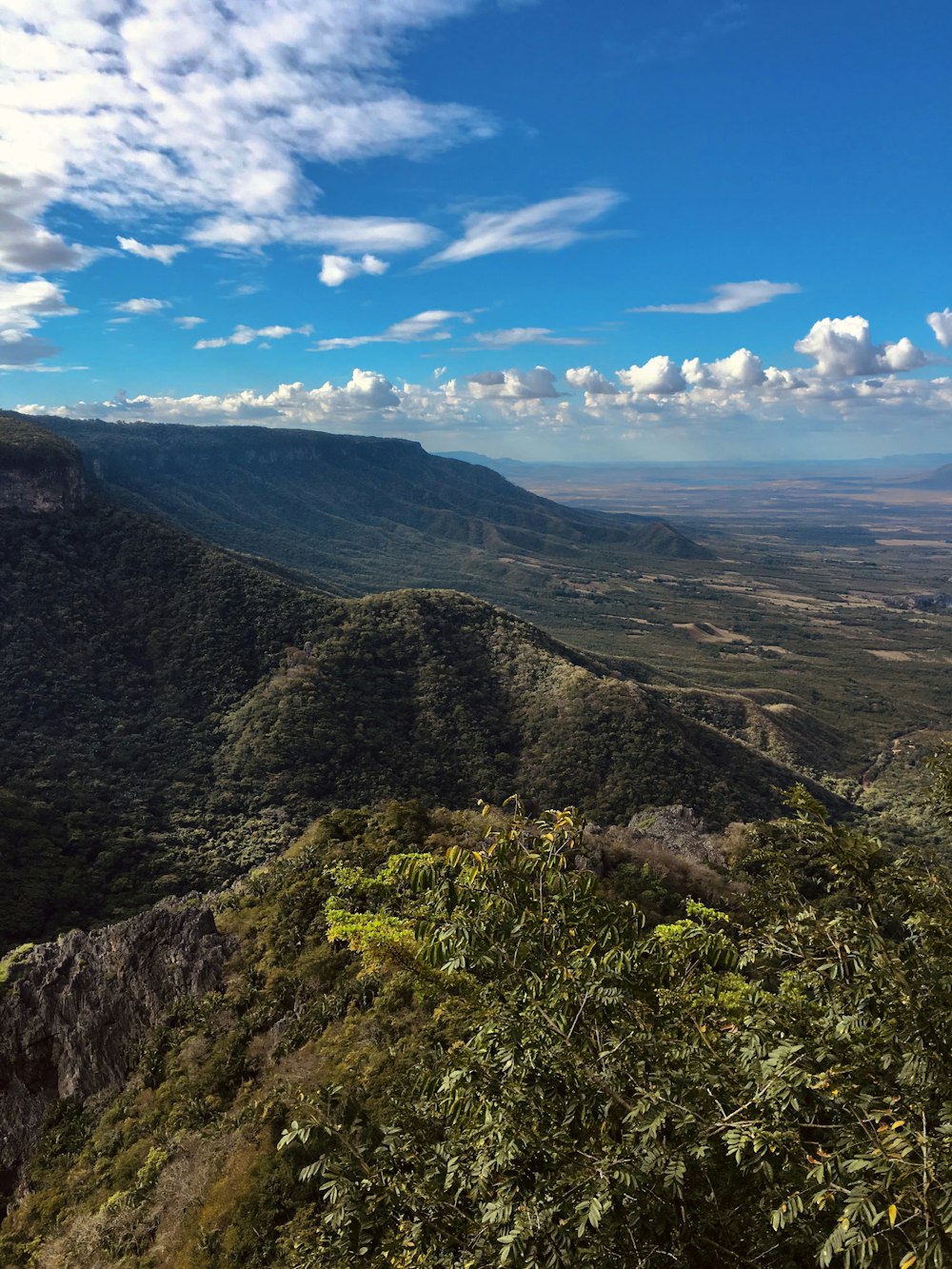 green and brown mountains under blue sky during daytime