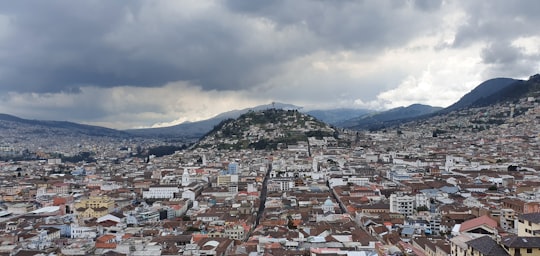 aerial view of city buildings during daytime in Basilica del Voto Nacional Ecuador