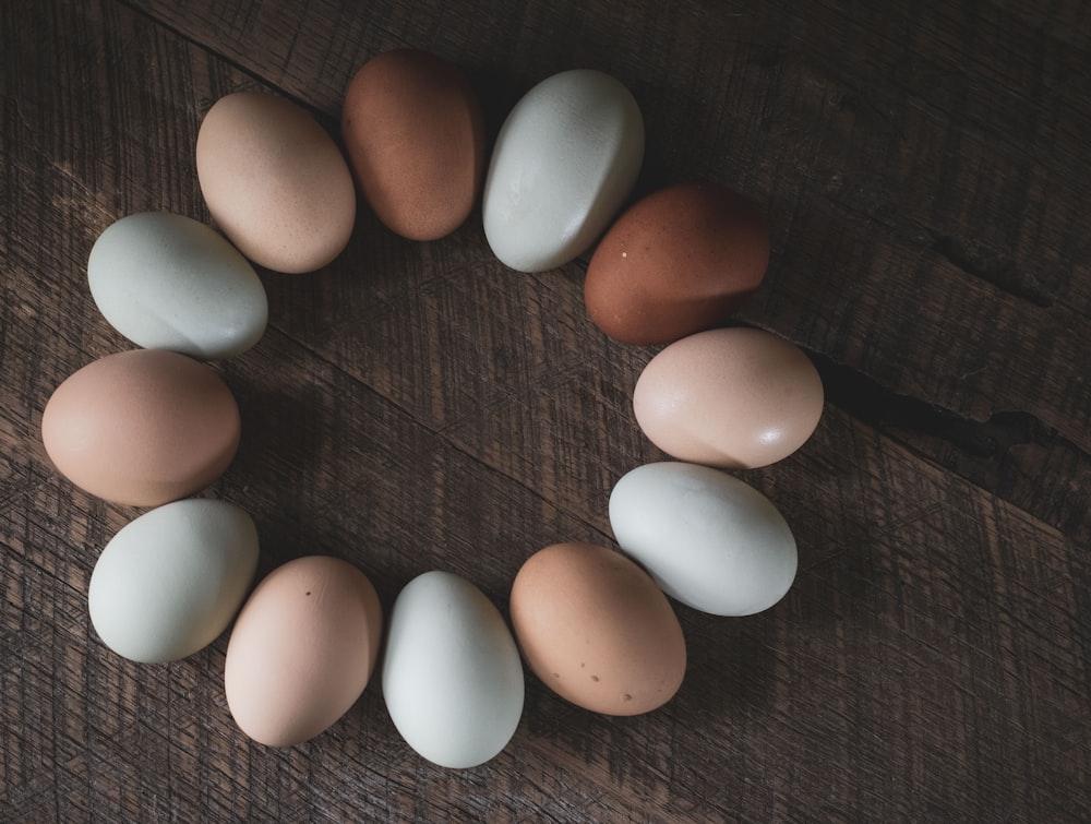 white egg on brown wooden table