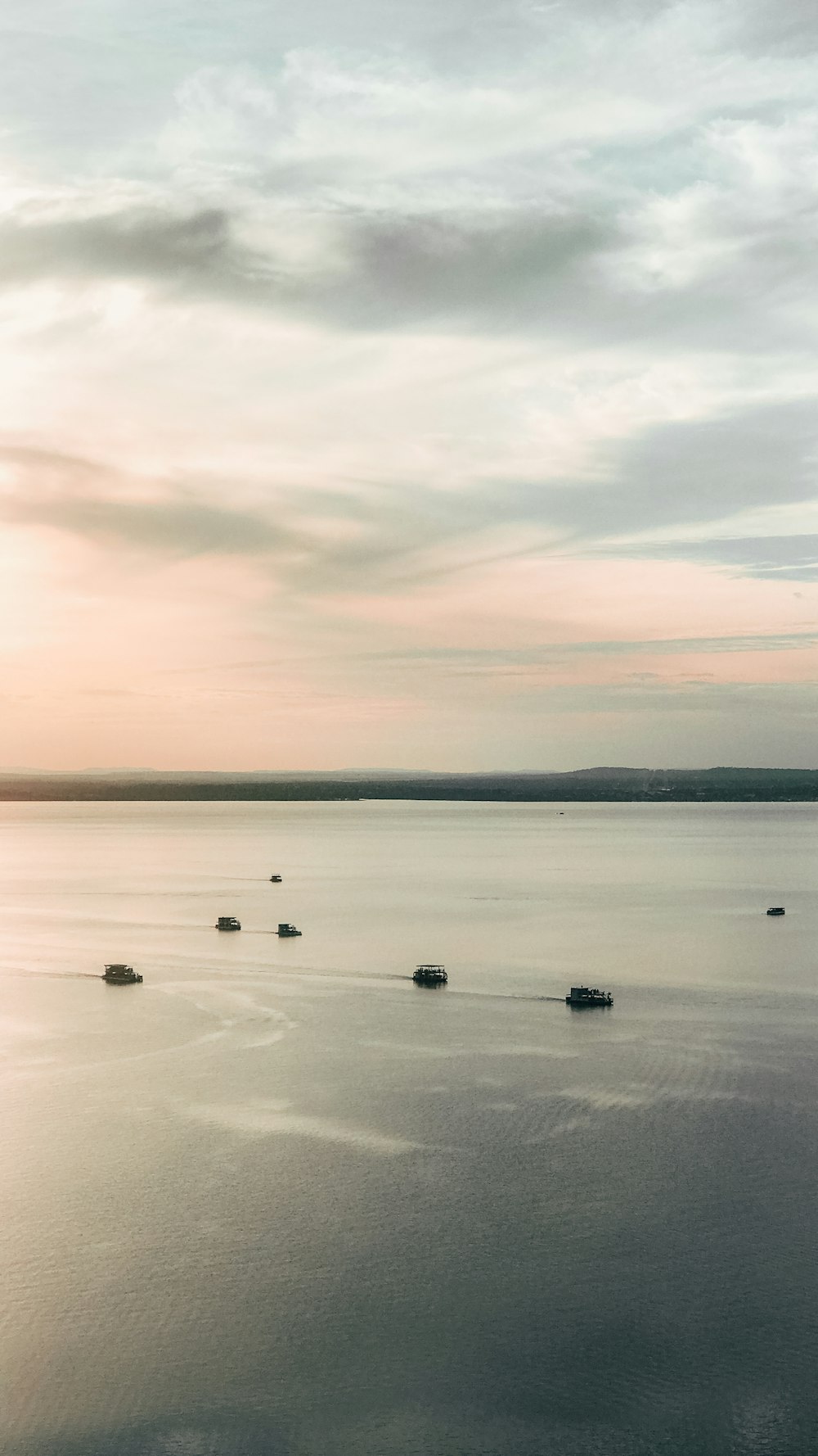 body of water under cloudy sky during daytime