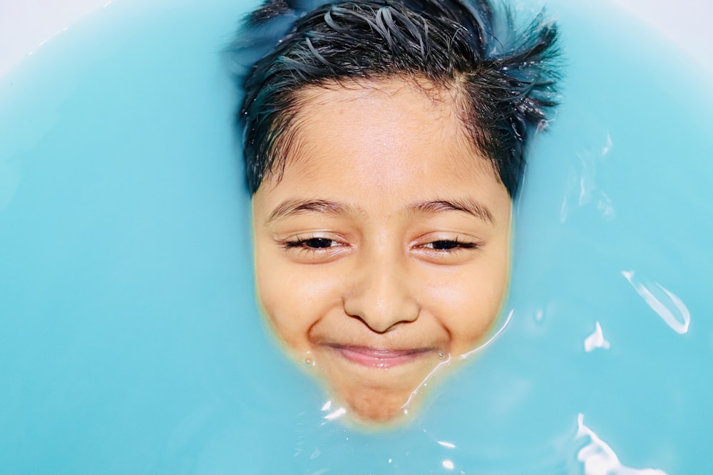 girl in water with water splash