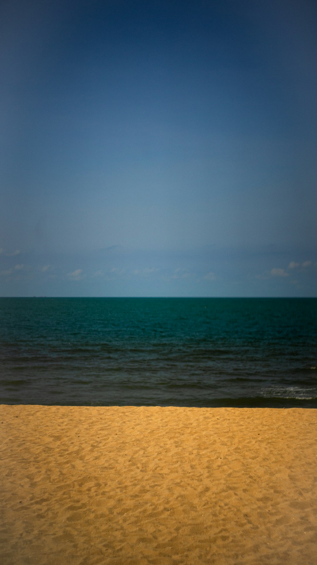 blue sea under blue sky during daytime