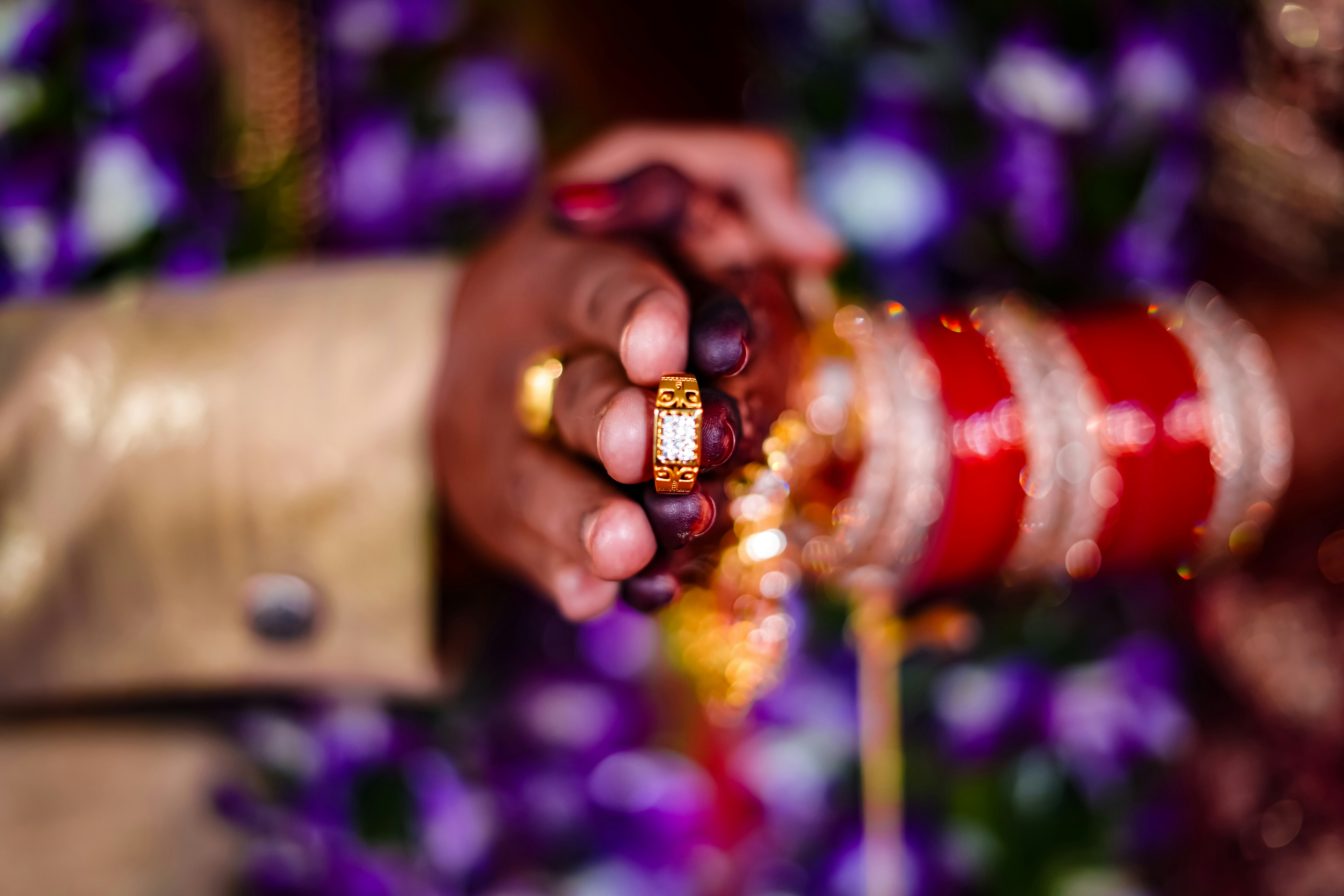 Get the wedding ring in your hand and get it photographed.