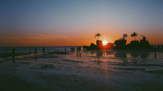 silhouette of people on beach during sunset in Boracay Philippines