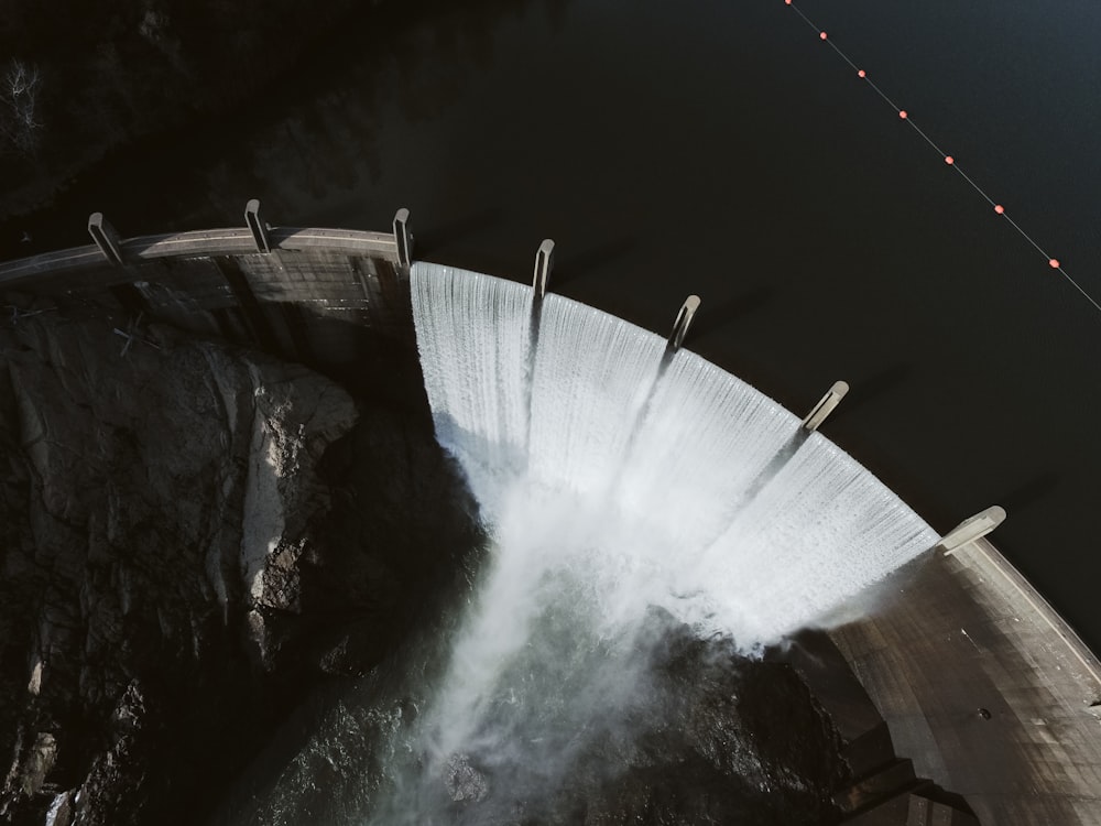 water falls in grayscale photography