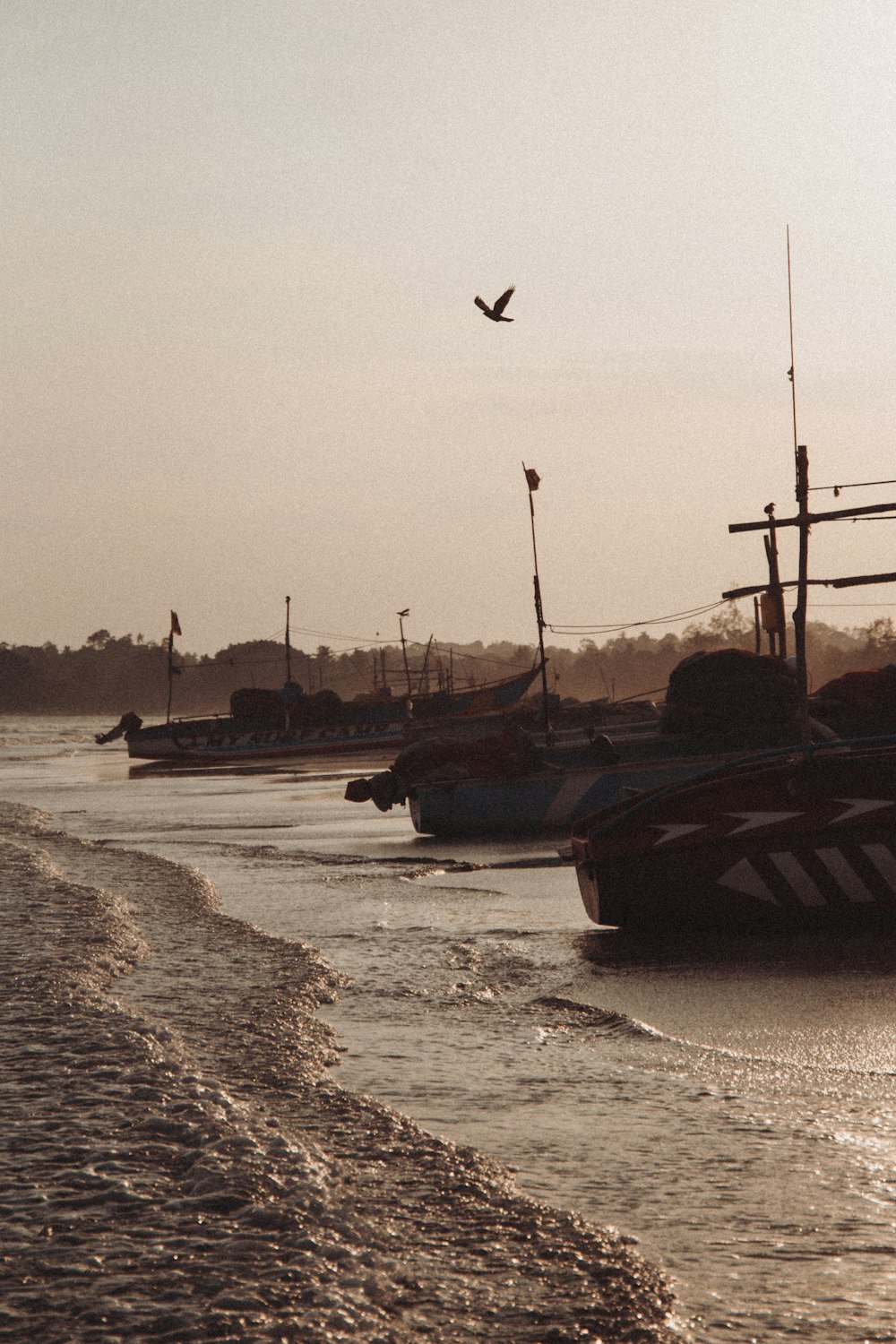 black and white ship on sea during daytime