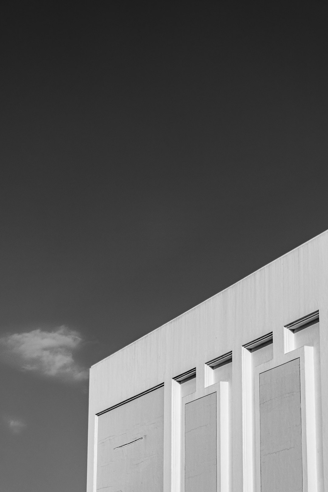 grayscale photo of concrete building