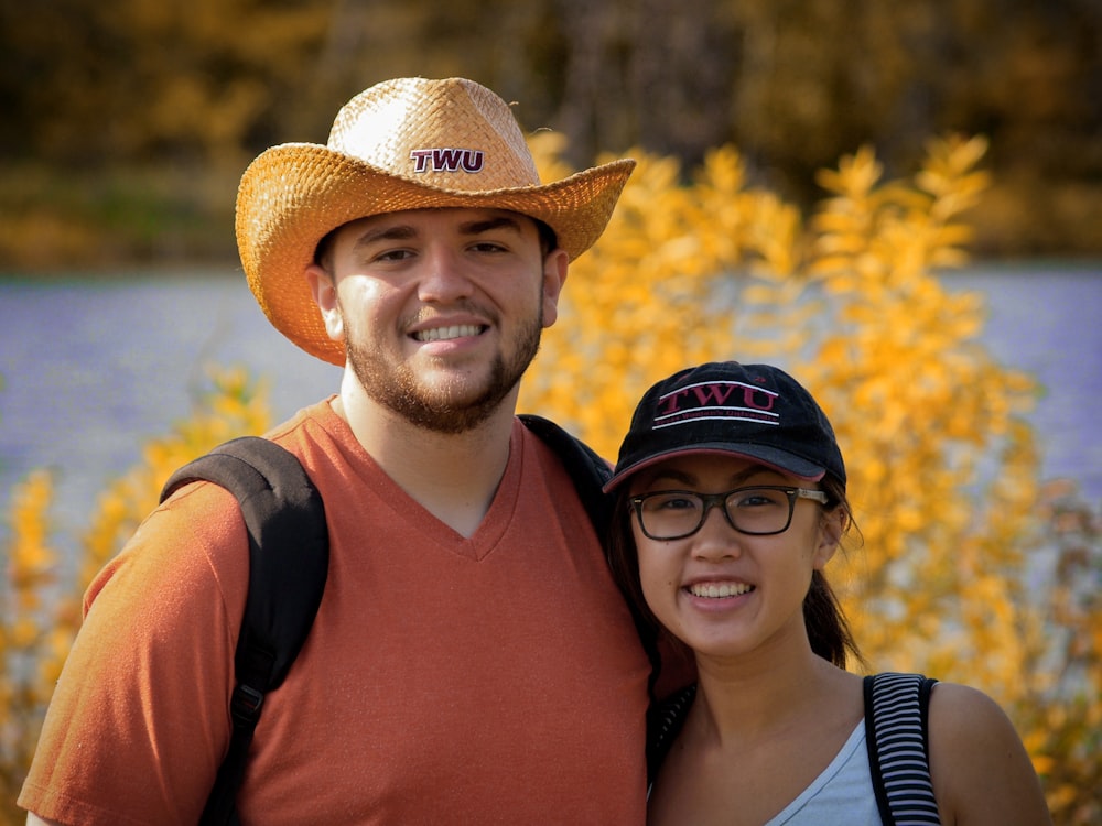 man in brown cowboy hat beside woman in brown cowboy hat