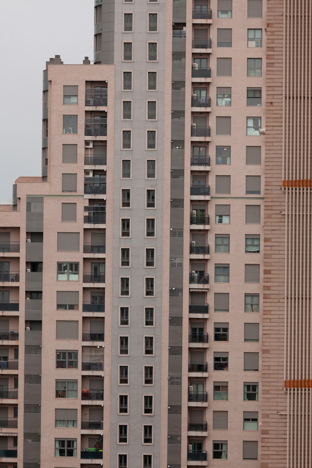 brown and white concrete building during daytime