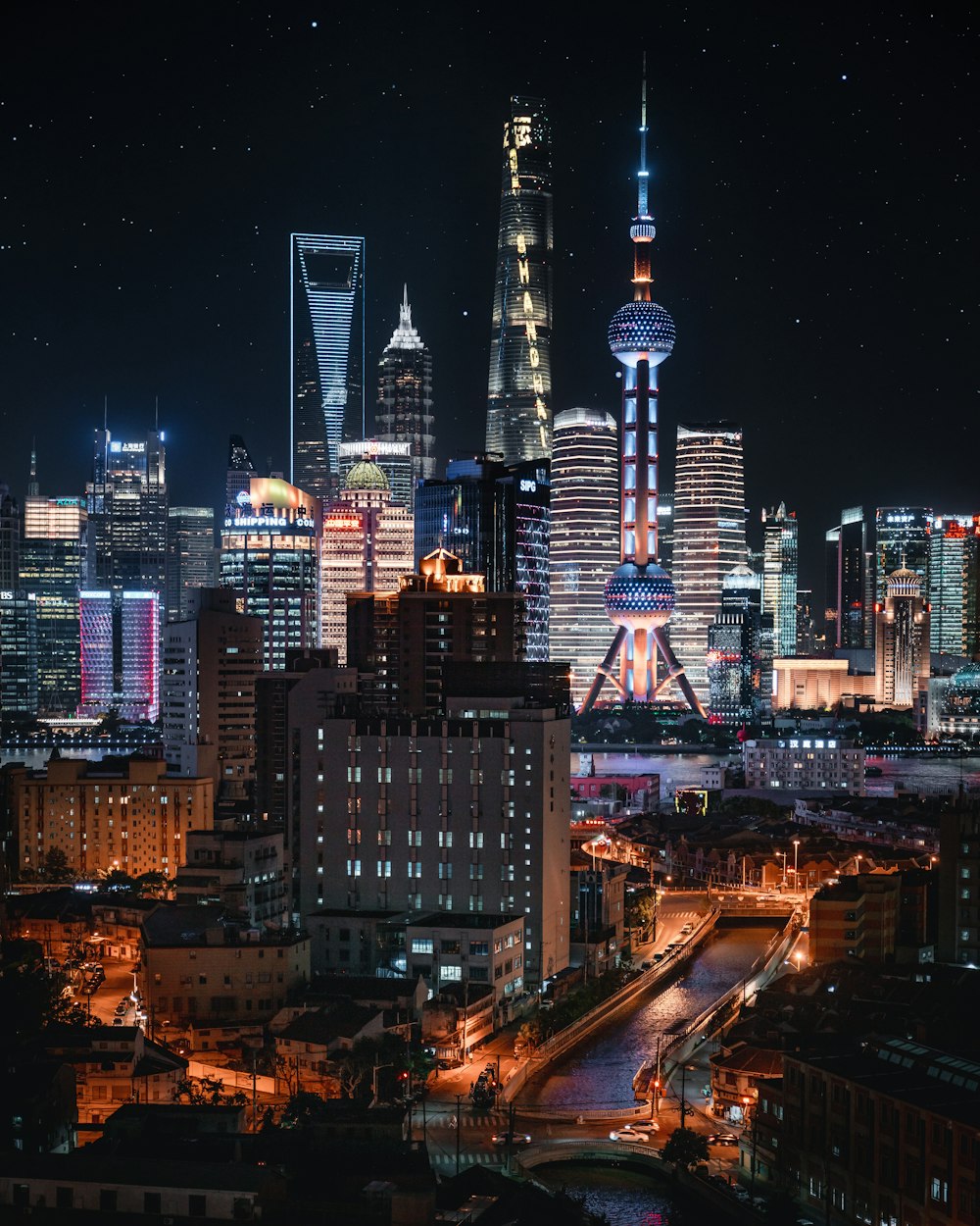 city skyline during night time