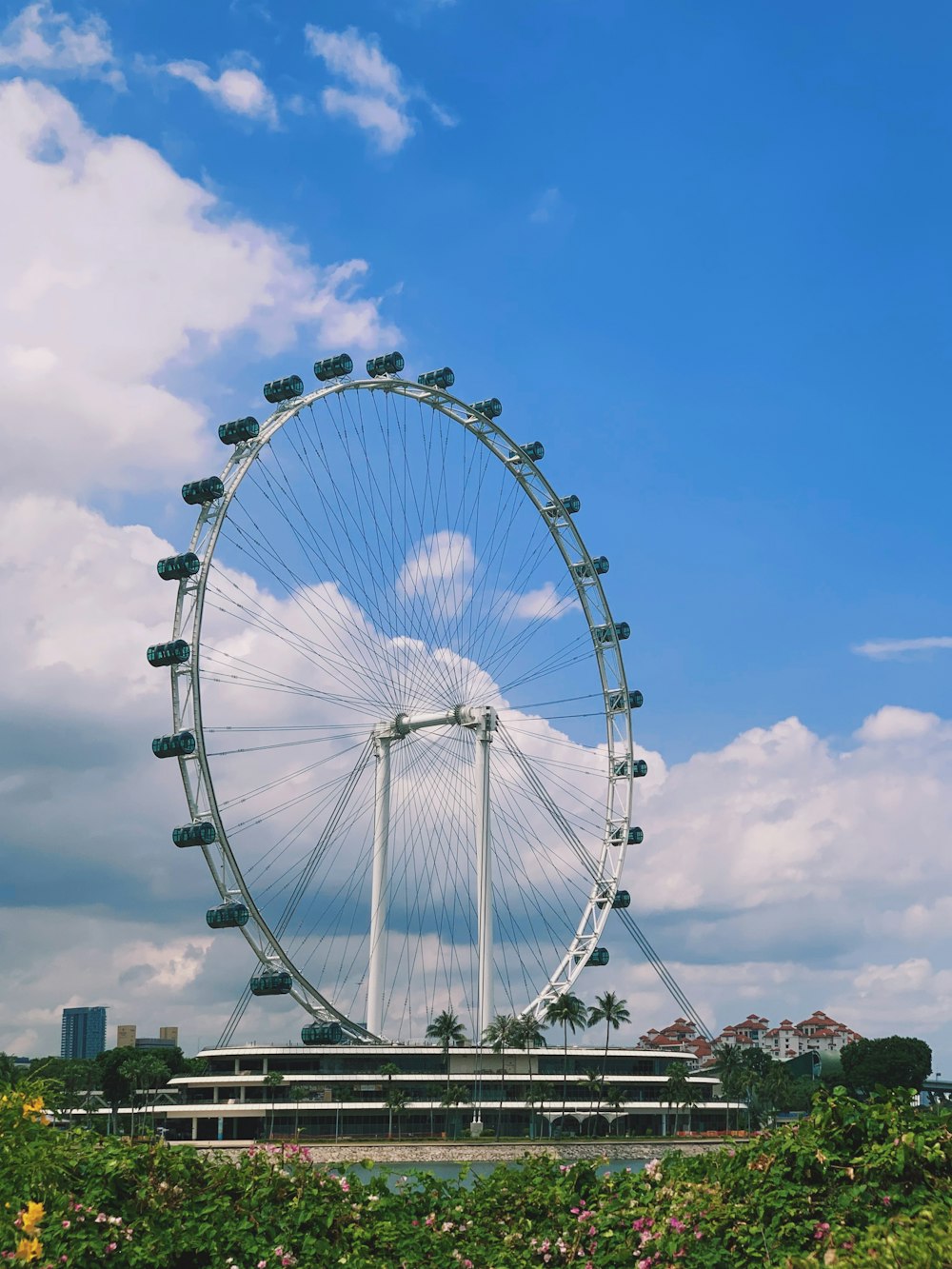 white ferris wheel under blue sky during daytime