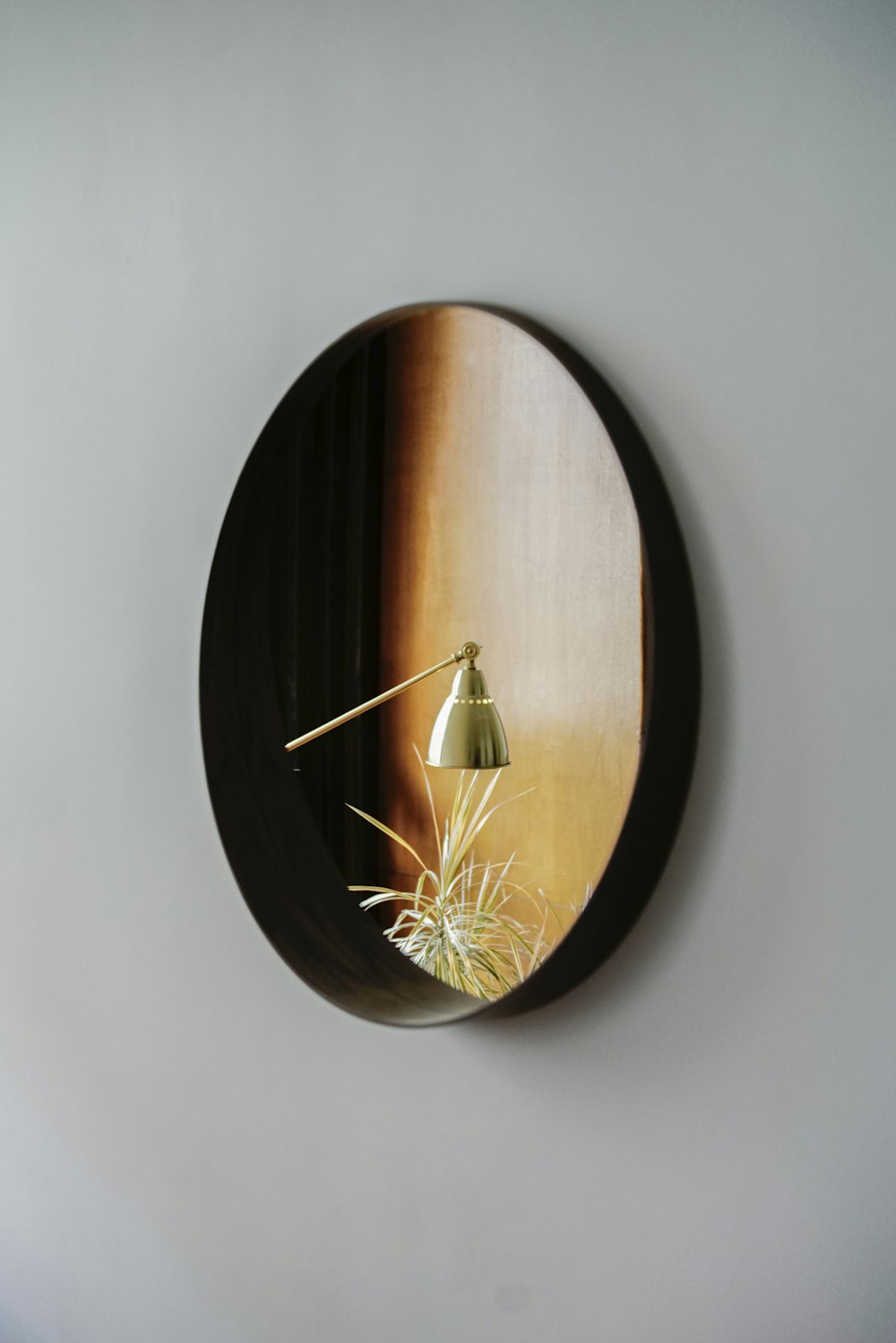 brown wooden round wall clock