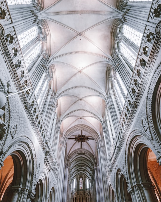 white and gray concrete building interior in Bayeux Cathedral France