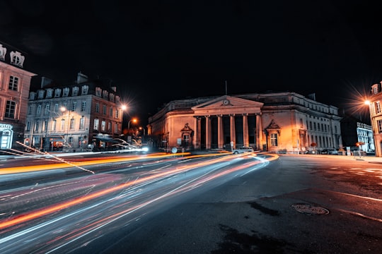 time lapse photography of cars on road during night time in Caen France