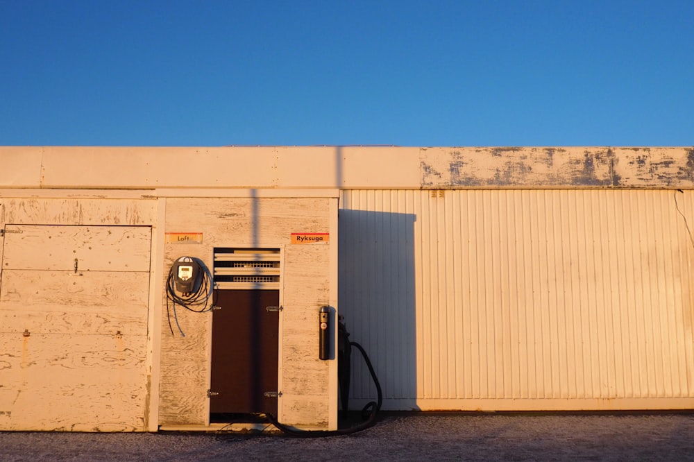 white and brown steel container van