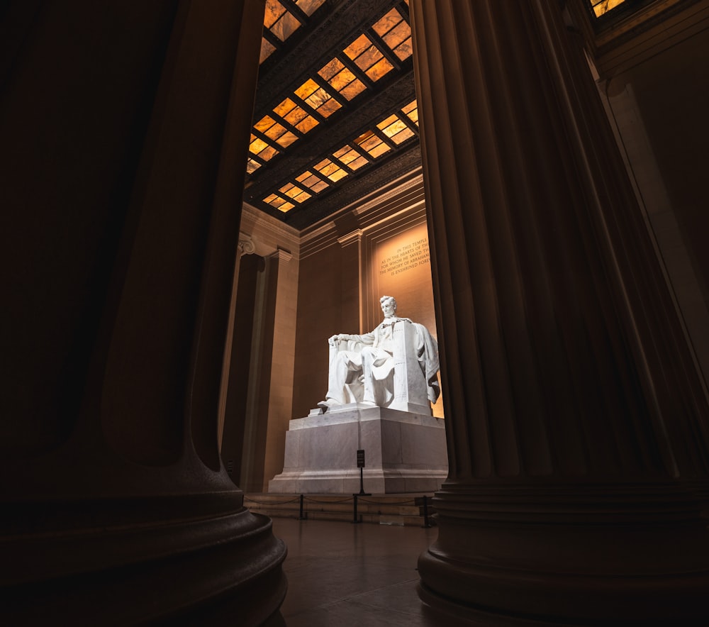 white concrete statue inside building