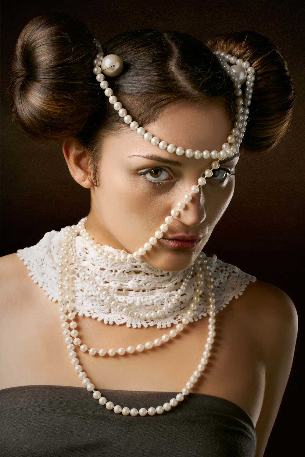 woman in white pearl necklace