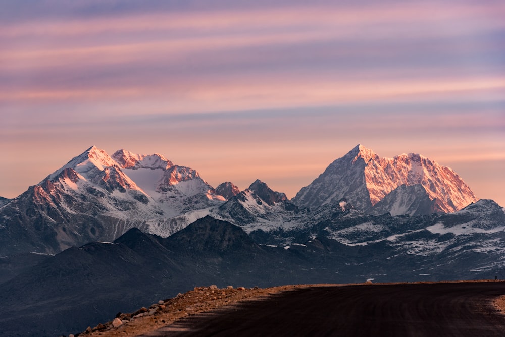 snow covered mountain during daytime