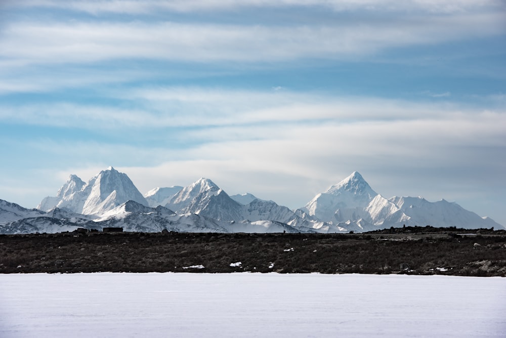 snow covered mountain under blue sky during daytime