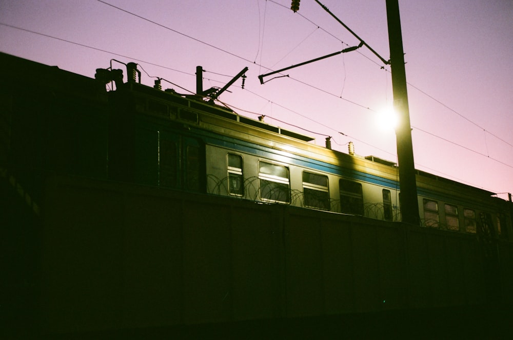 white and black train on a sunny day