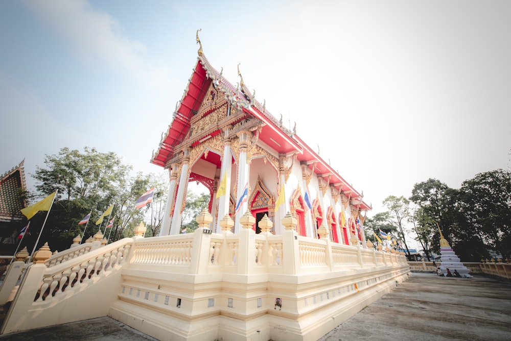 red and white temple during daytime