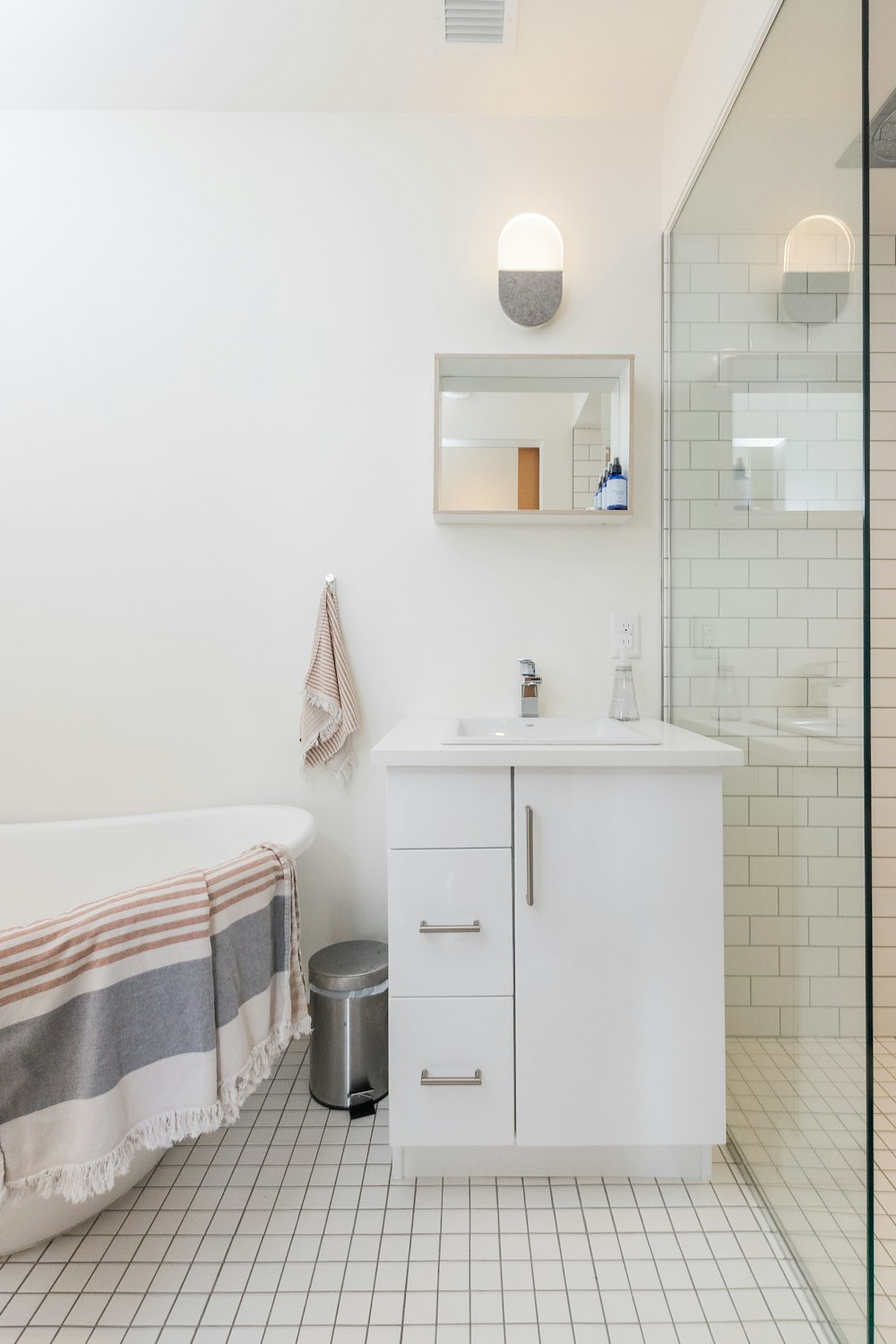 white wooden cabinet with mirror