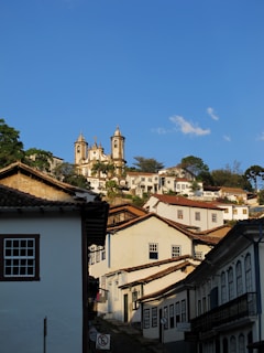 Panoramic view of colonial architecture in San Miguel de Allende under a bright blue sky