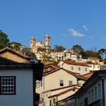 white and brown concrete buildings under blue sky during daytime