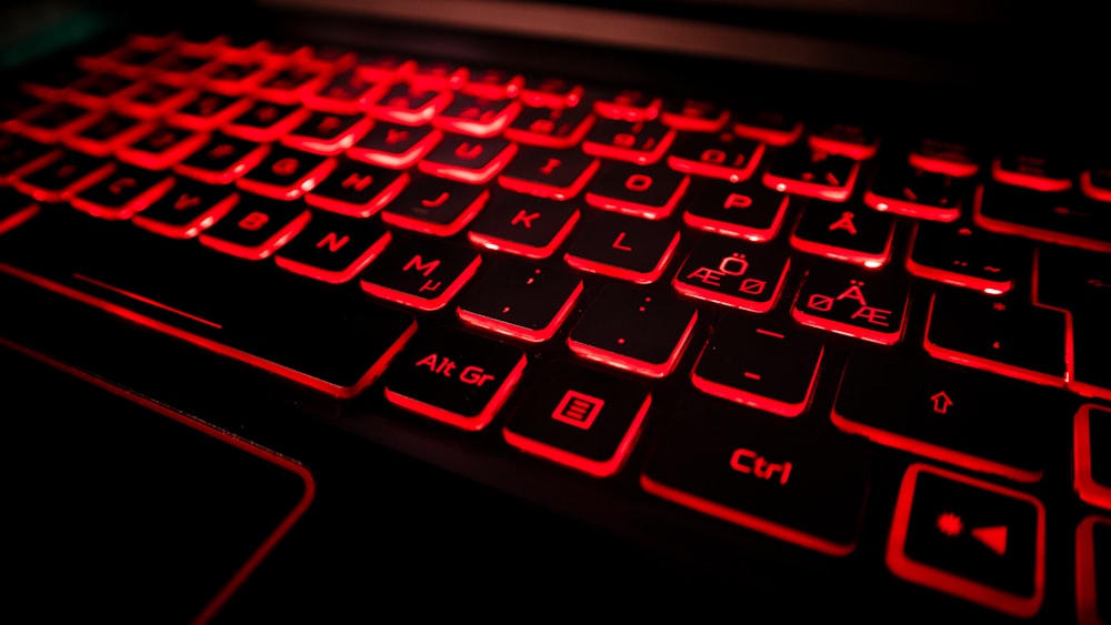 black and red laptop computer