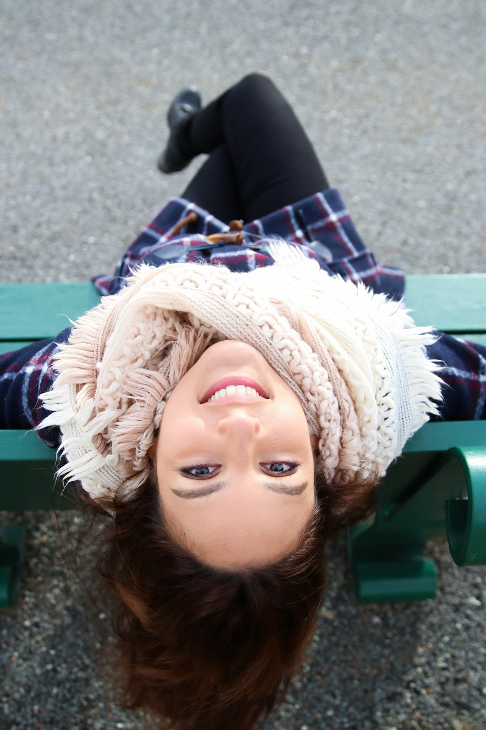 girl in white and blue knit cap