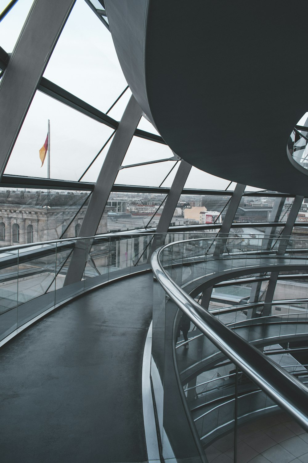 black and gray escalator inside building