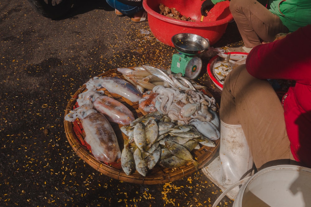 fish on brown wooden round tray