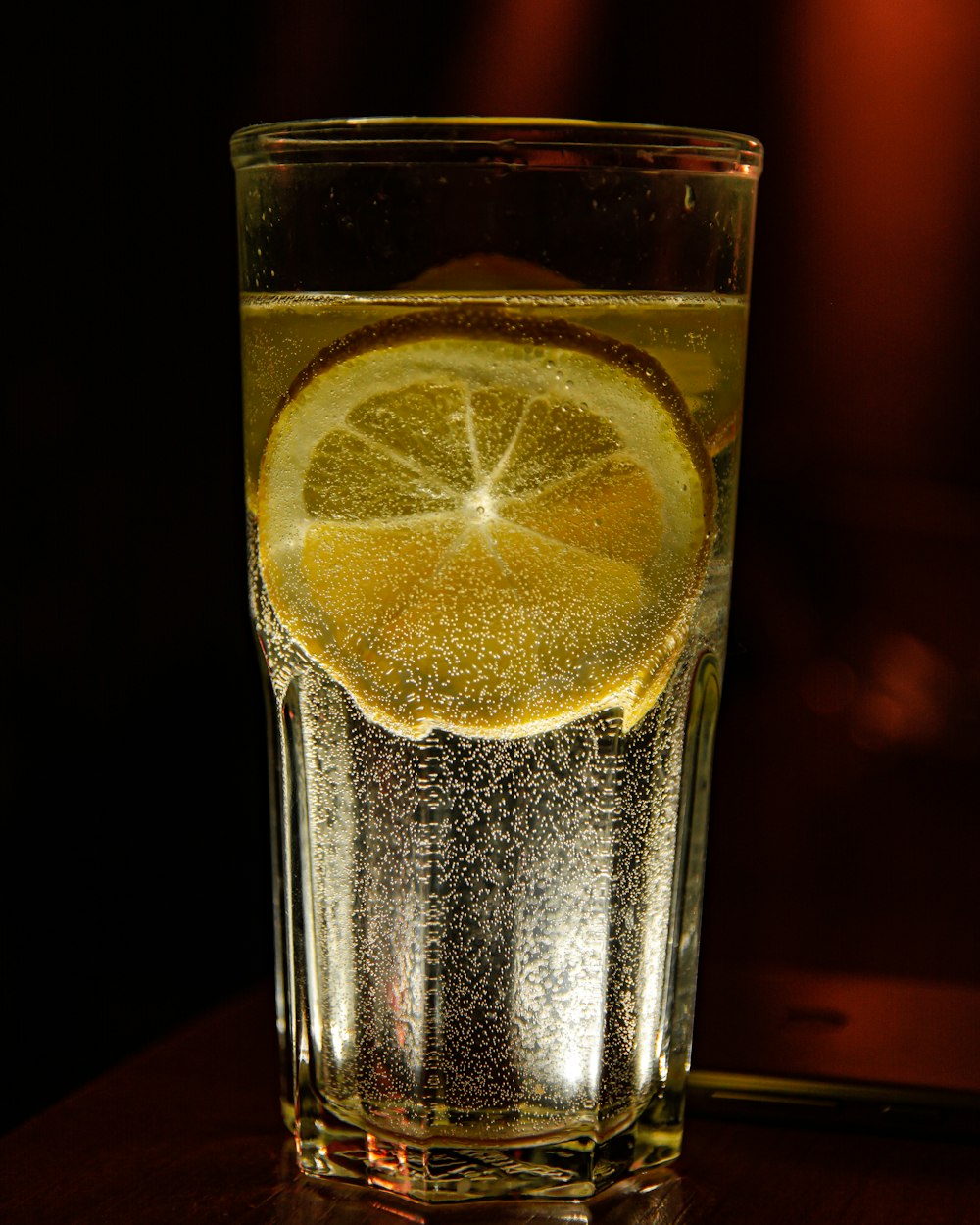 clear drinking glass with lemon