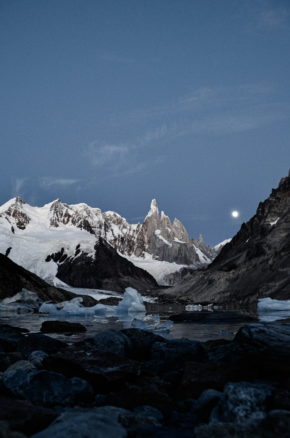 snow covered mountain during daytime