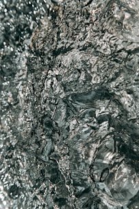 water splash on brown rock