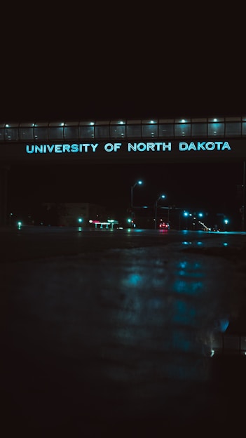 a bridge that has a sign above it that says university of north dakota
