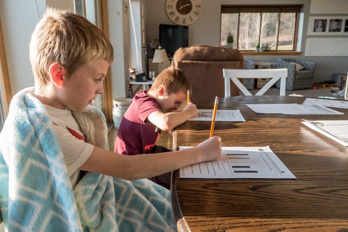 Homeschool student reading a book at home as part of an AI-supported learning plan
