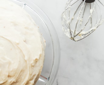 white cream in clear glass bowl