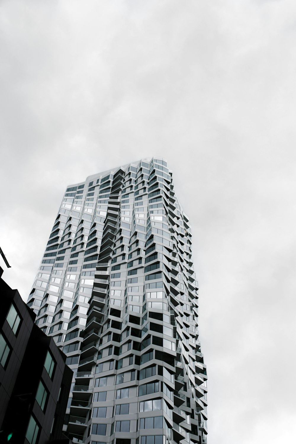 grayscale photo of high rise building