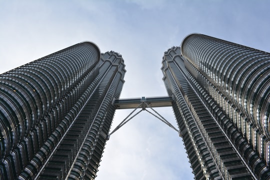 low angle photography of high rise building in Petronas Twin Towers Malaysia