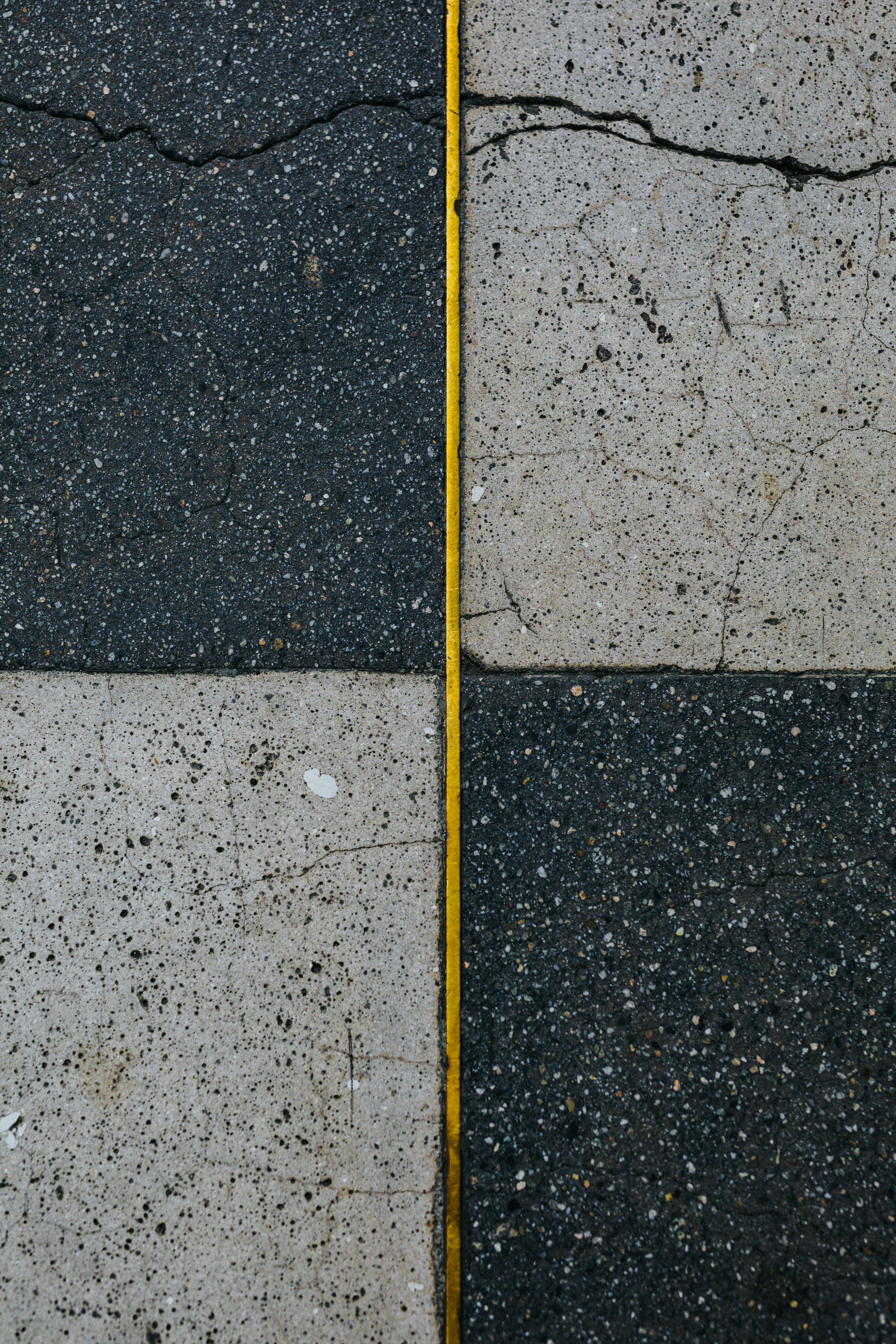 Concrete paving slabs featuring various textures and colours